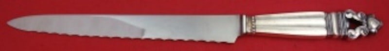 Georg Jensen Acorn Sterling Silver 11 1/4 Bread Knife: Georg Jensen Acorn Sterling Silver 11 1/4 Bread Knife This exquisite bread knife features a striking pointed blade and a hollow handle, crafted from high-quality sterling silver. Part of the renowned 