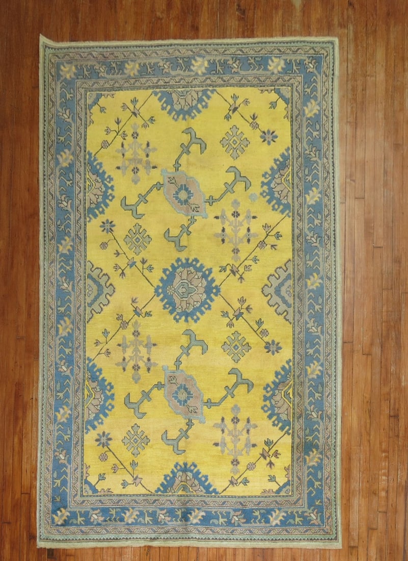 6' 1" x 9' 9" Early 20th Century Turkish Oushak Rug Yellow: 6' 1" x 9' 9" Early 20th Century Turkish Oushak Rug Yellow Early 20th century Turkish Oushak rug with a predominantly yellow field and traditional patterned design. This pre-owned rug is identified as