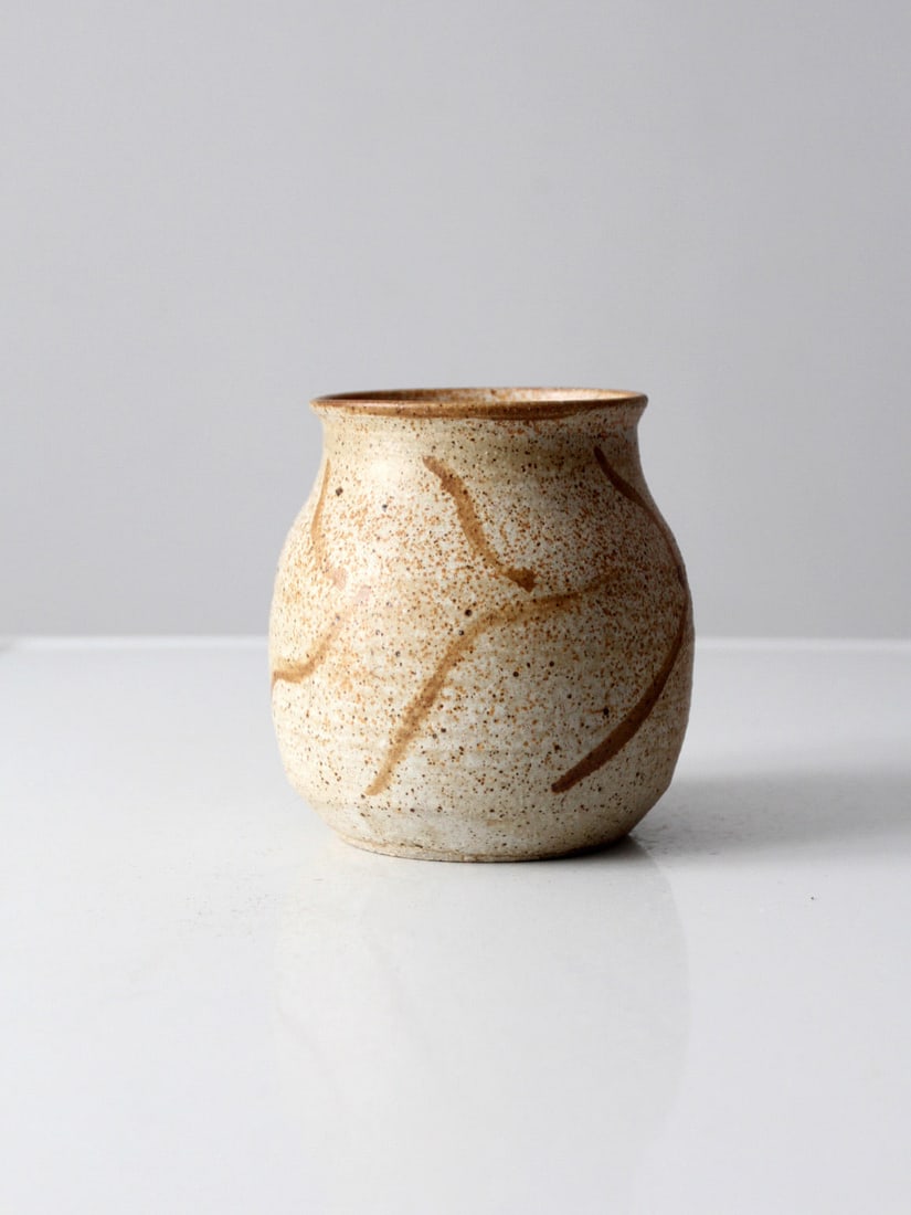 Handcrafted Vintage Studio Pottery Vase by CWG with Speckled Brown Glaze: Handcrafted Vintage Studio Pottery Vase by CWG with Speckled Brown Glaze This vintage studio pottery vase is a unique hand-crafted piece signed by the artist, CWG. It showcases a speckled brown glaze 