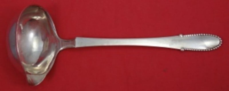 Georg Jensen Beaded Sterling Silver Gravy Ladle 7.5 inch: Georg Jensen Beaded Sterling Silver Gravy Ladle 7.5 inch This elegant gravy ladle is crafted from sterling silver in the renowned Beaded pattern by Georg Jensen. Measuring 7 1/2 inches, it features a 