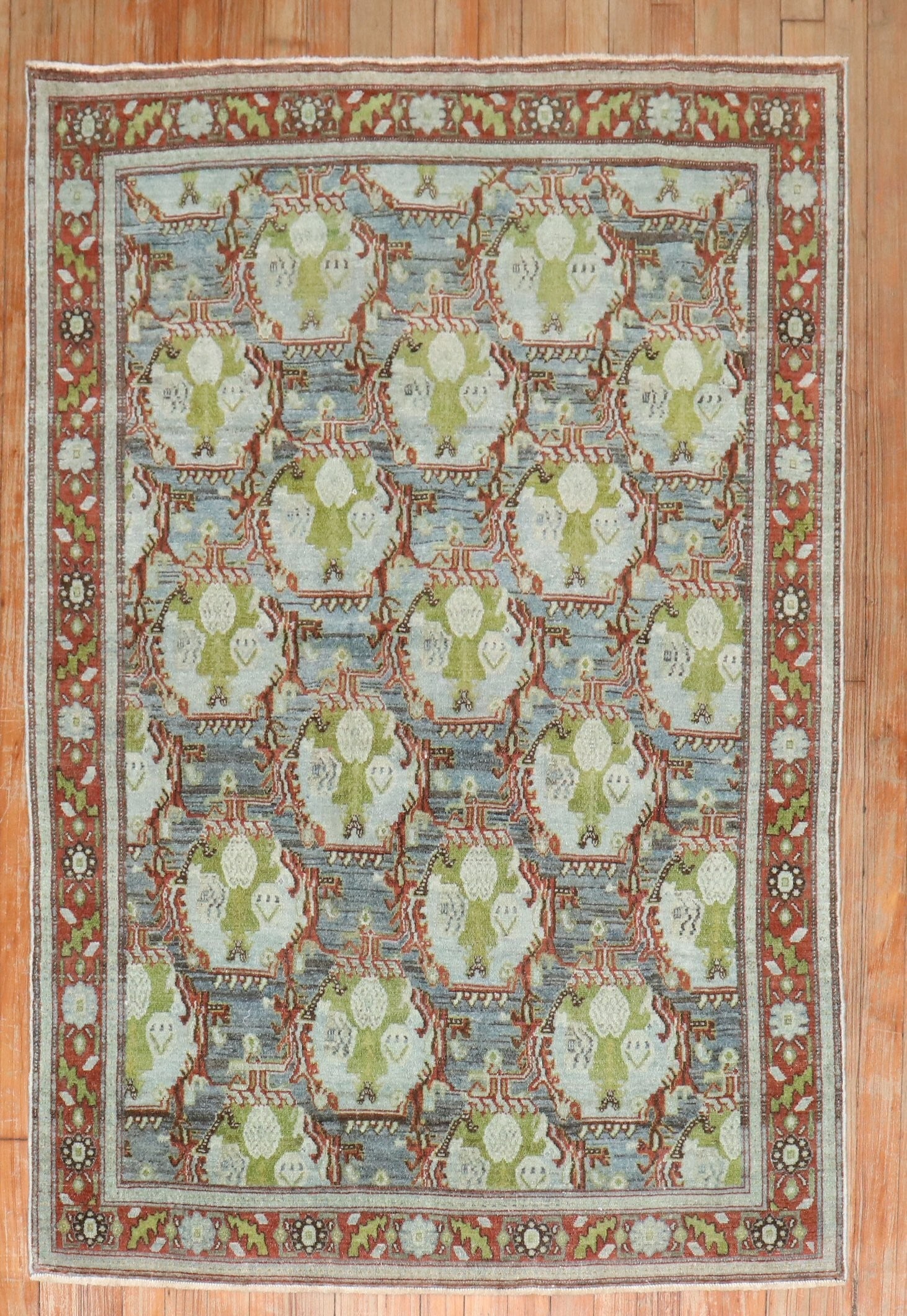 3' 7" x 5' 1" Persian Senneh Small Rug 1920s: 3' 7" x 5' 1" Persian Senneh Small Rug 1920s Antique Persian Senneh rug from the 1920s. This small pre-owned rug features a decorative floral and geometric pattern. Specifications Type: Senneh Origin: