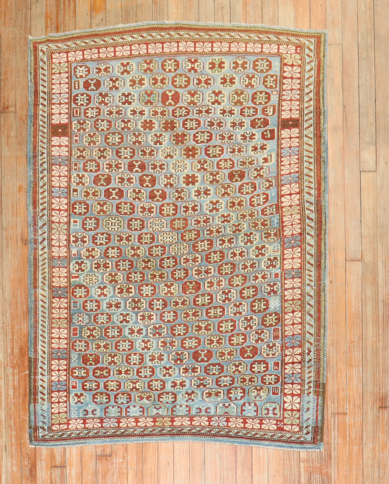 3' 8" x 4' 10" Late 19th Century Kuba Rug: 3' 8" x 4' 10" Late 19th Century Kuba Rug Late 19th century Caucasian Kuba rug in a small format. This pre-owned piece is identified as a Caucasian Kuba rug. Specifications Title: Antique Caucasian Ku