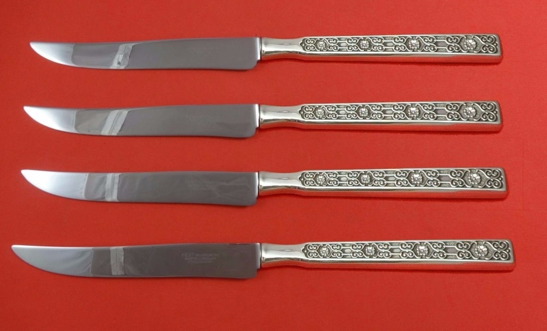 Gorham Spanish Tracery Sterling Silver 4-Piece Steak Knife Set Texas Sized: Gorham Spanish Tracery Sterling Silver 4-Piece Steak Knife Set Texas Sized Elevate your dining experience with the Spanish Tracery Steak Knife Set by Gorham. Crafted from sterling silver, this excepti