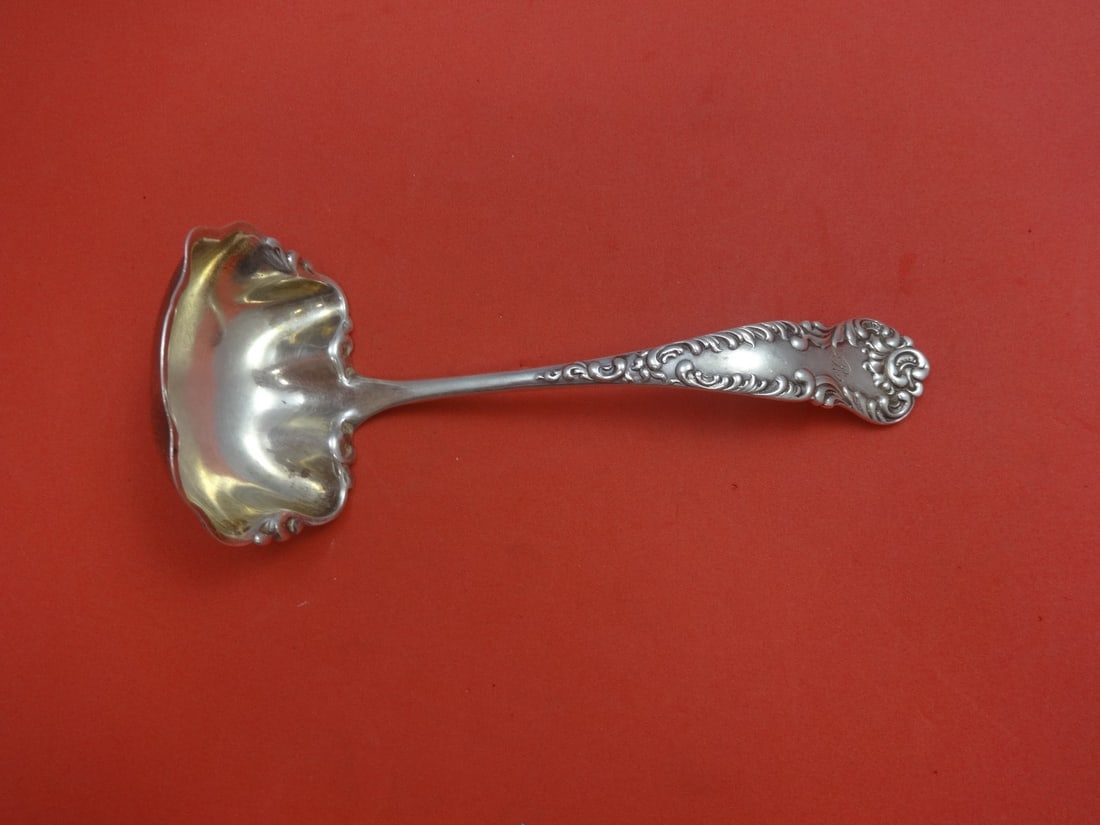 Knowles Argo Sterling Silver 7 Inch Gravy Ladle Monogrammed: Knowles Argo Sterling Silver 7 Inch Gravy Ladle Monogrammed Enhance your dining experience with this exquisite Argo by Knowles Sterling Silver Gravy Ladle. Measuring 7 inches, this ladle features a cl