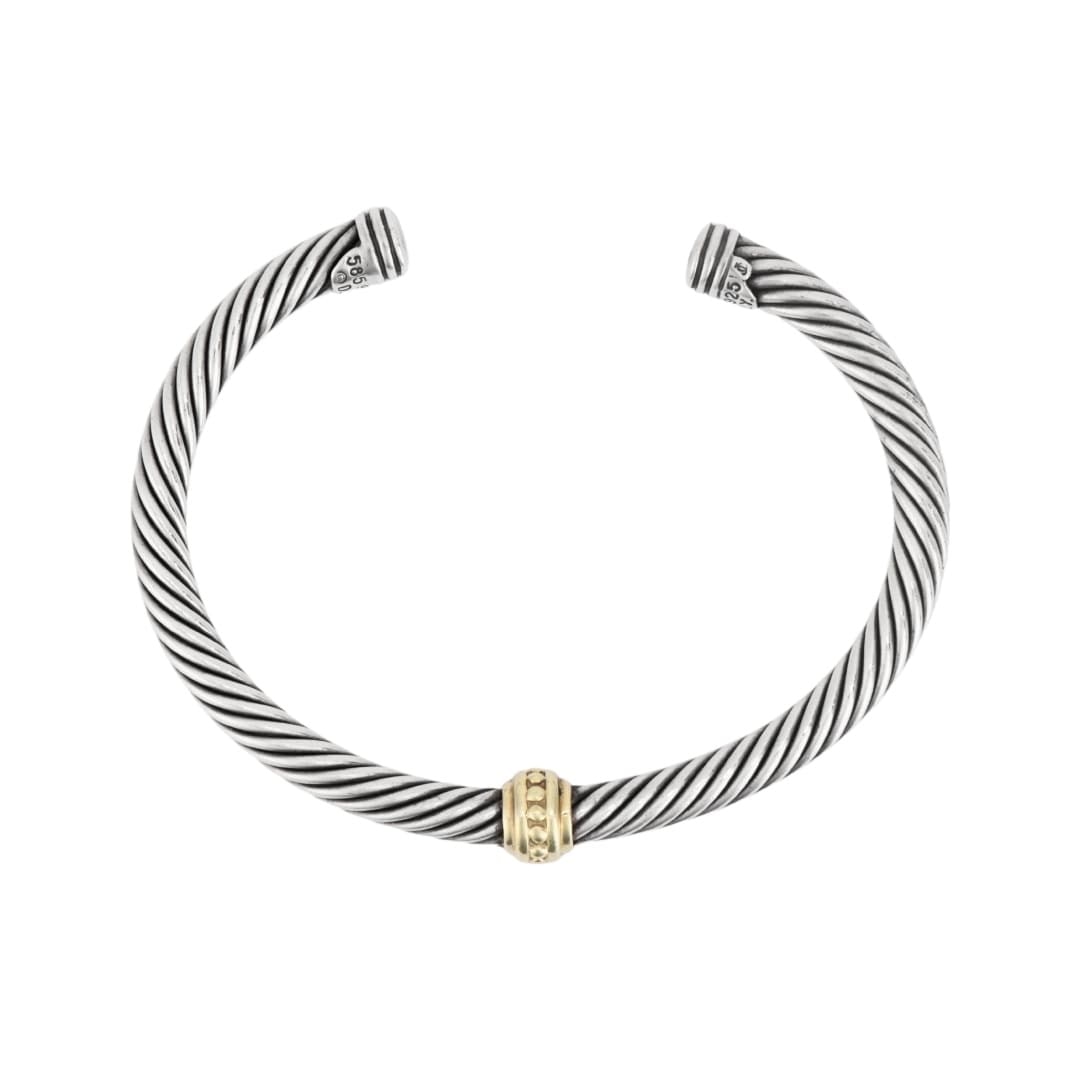 David Yurman Classic Cable Cuff Bracelet Sterling Silver 14K Gold 5mm: David Yurman Classic Cable Cuff Bracelet Sterling Silver 14K Gold 5mm Pre-owned David Yurman Classic Cable bracelet crafted in sterling silver and 14K yellow gold. This cuff-style bracelet features th