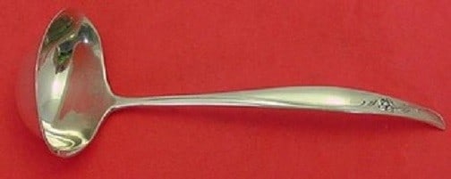 Gorham Sea Rose Sterling Silver Gravy Ladle 7 Inch: Gorham Sea Rose Sterling Silver Gravy Ladle 7 Inch Elevate your dining experience with the Sea Rose by Gorham Sterling Silver Gravy Ladle, measuring 7 inches. This exquisite ladle features the elegant
