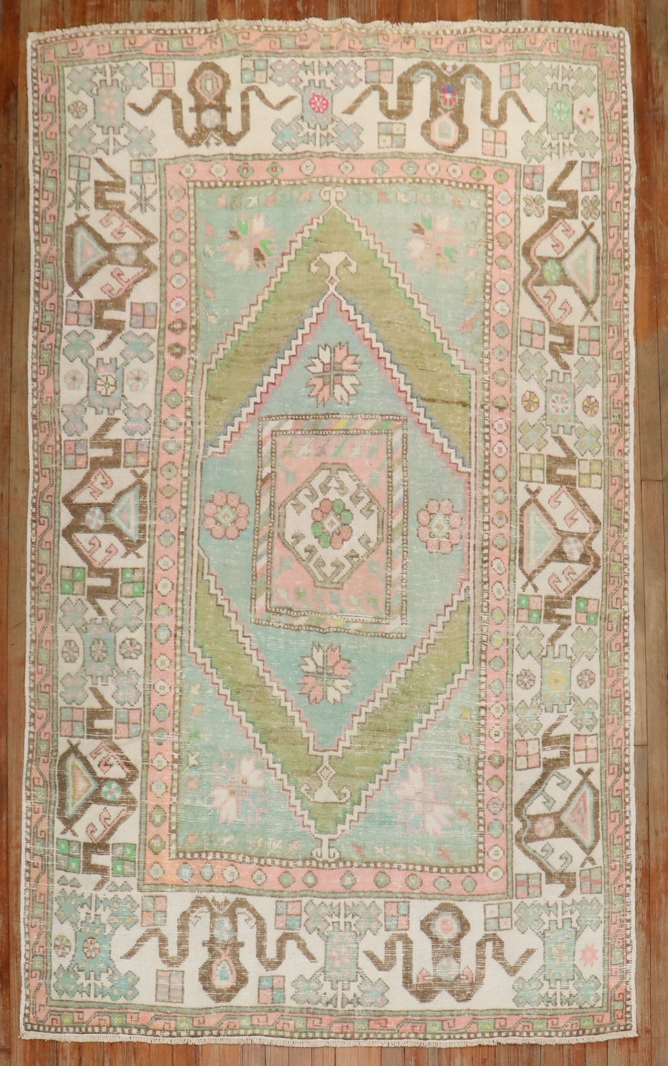 5' 1" x 8' 5" Mid 20th Century Anatolian Rug: 5' 1" x 8' 5" Mid 20th Century Anatolian Rug Mid 20th century Anatolian Turkish rug in soft pastel tones. This pre-owned intermediate-size rug offers a classic Anatolian design with a versatile palett