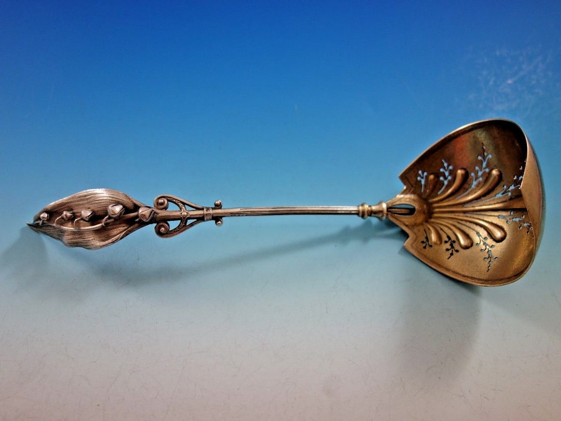 Gorham Lily of the Valley 1865 Sterling Silver Sugar Sifter: Gorham Lily of the Valley 1865 Sterling Silver Sugar Sifter This exquisite sugar sifter, crafted by Gorham in the Lily of the Valley pattern circa 1865, showcases the timeless elegance of sterling sil