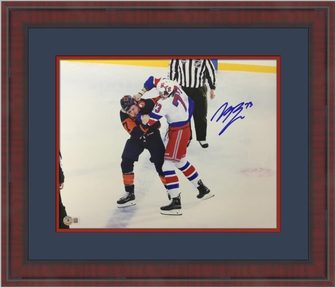 Matt Rempe New York Rangers Signed 11 x 16 Photo Custom Framed Beckett COA: Matt Rempe New York Rangers Signed 11 x 16 Photo Custom Framed Beckett COA This is an original signed photograph of Matt Rempe, a player for the New York Rangers, framed beautifully for display. The p