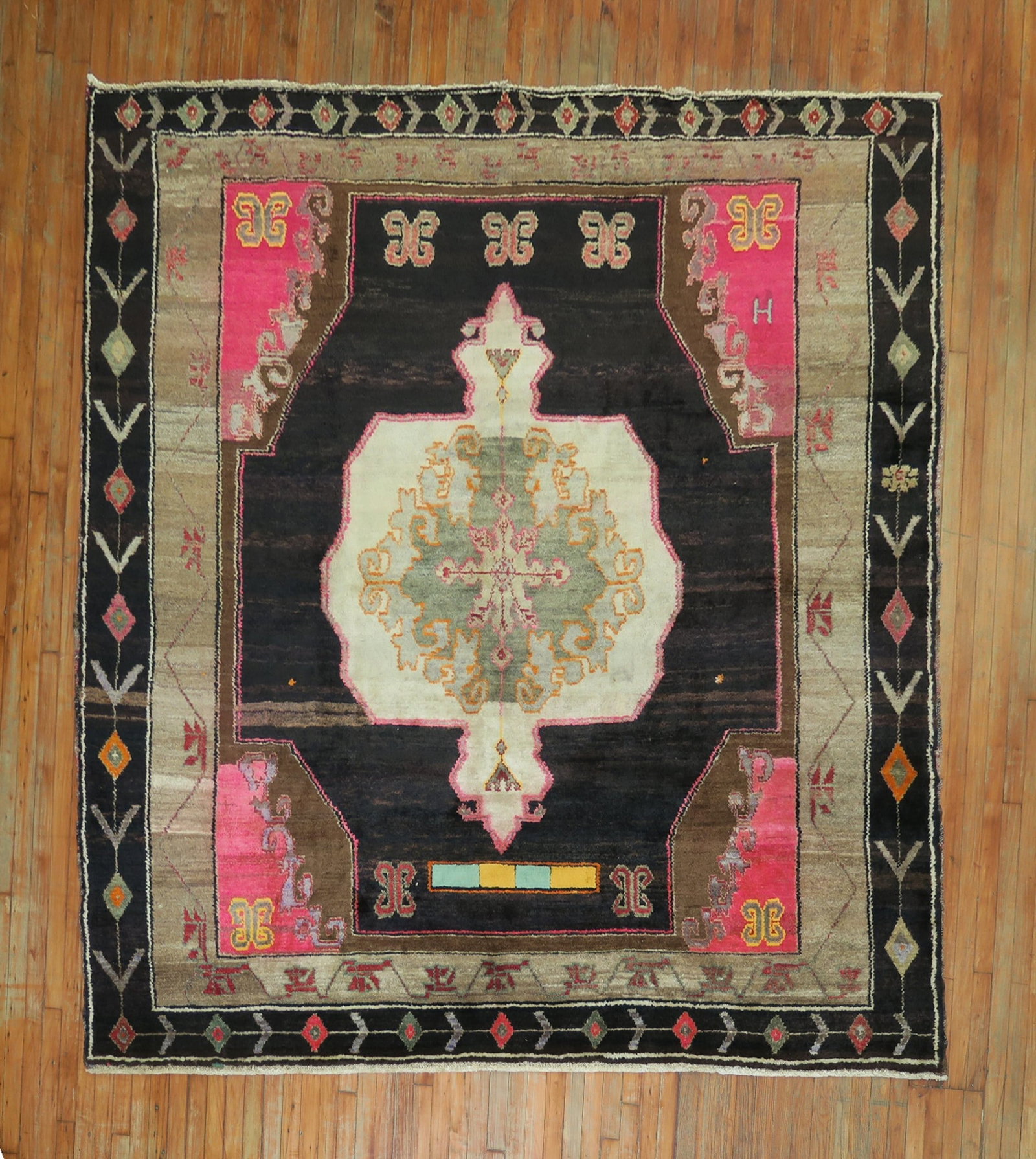 8' 7" x 8' 9" Turkish Kars square rug Mid 20th century: 8' 7" x 8' 9" Turkish Kars square rug Mid 20th century Mid 20th century Turkish Kars rug featuring bright pink corner accents on an abrashed dark brown ground. The outer border has a nomadic feel, whi