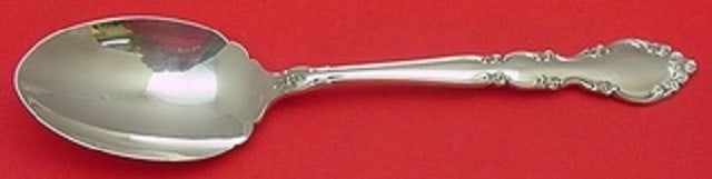 Oneida Grandeur Sterling Silver Serving Spoon 8 1/4 inches: Oneida Grandeur Sterling Silver Serving Spoon 8 1/4 inches This exquisite serving spoon from Oneida is crafted from high-quality sterling silver and features the elegant Grandeur pattern. Measuring 8 
