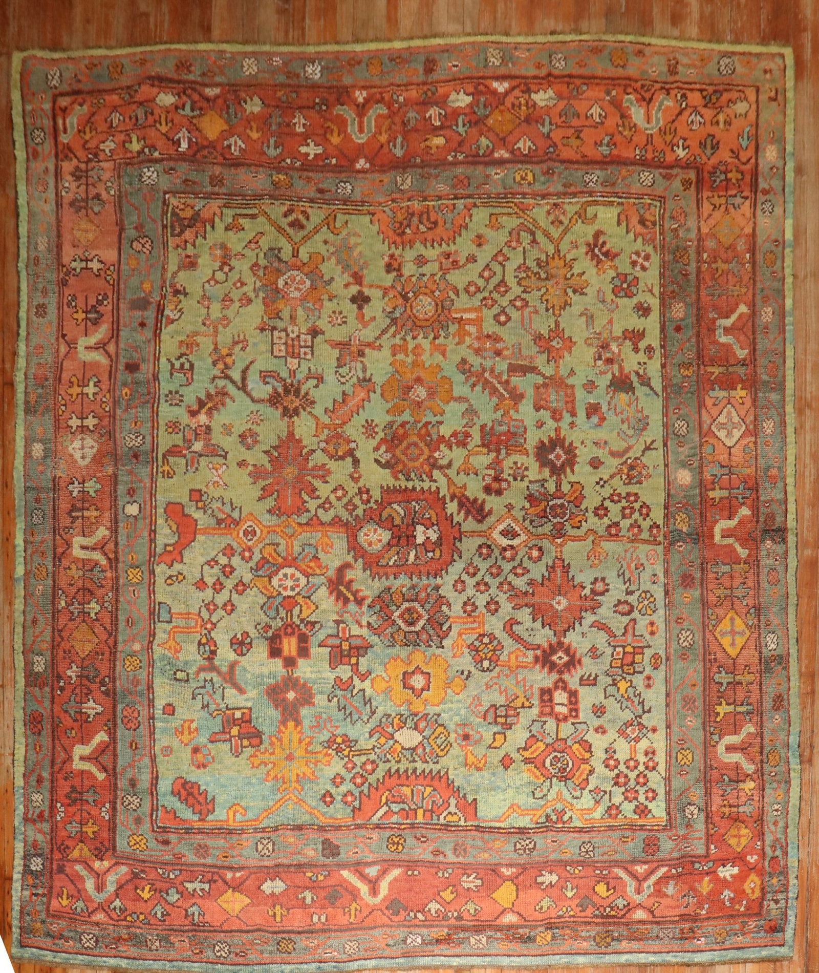 9' 9" x 11' Antique Oushak Square Carpet Green Ground: 9' 9" x 11' Antique Oushak Square Carpet Green Ground Antique square Oushak carpet from the 1900s with a green ground. This pre-owned room-size rug features the classic Oushak form in a square format.