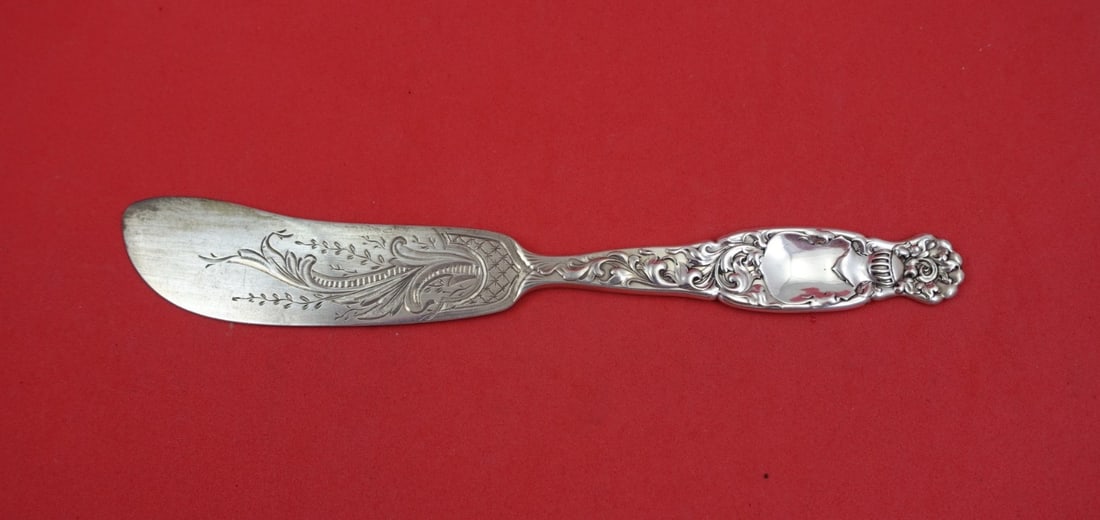 Sterling Silver Master Butter Knife Heraldic Pattern by Whiting 7 5/8 Inch: Sterling Silver Master Butter Knife Heraldic Pattern by Whiting 7 5/8 Inch This is a sterling silver master butter knife from the Heraldic pattern by Whiting. Featuring a flat handle and a brite-cut b