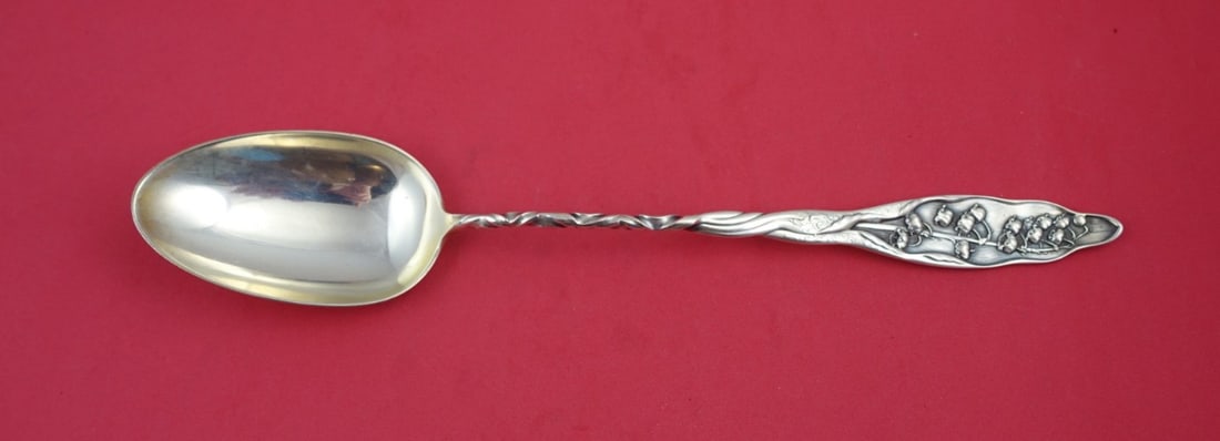 Whiting Sterling Silver 12 Serving Spoon Lily of the Valley 1888 Twist Handle: Whiting Sterling Silver 12 Serving Spoon Lily of the Valley 1888 Twist Handle This exquisite serving spoon is part of the "Lily of the Valley" pattern by Whiting, crafted in sterling silver and patent