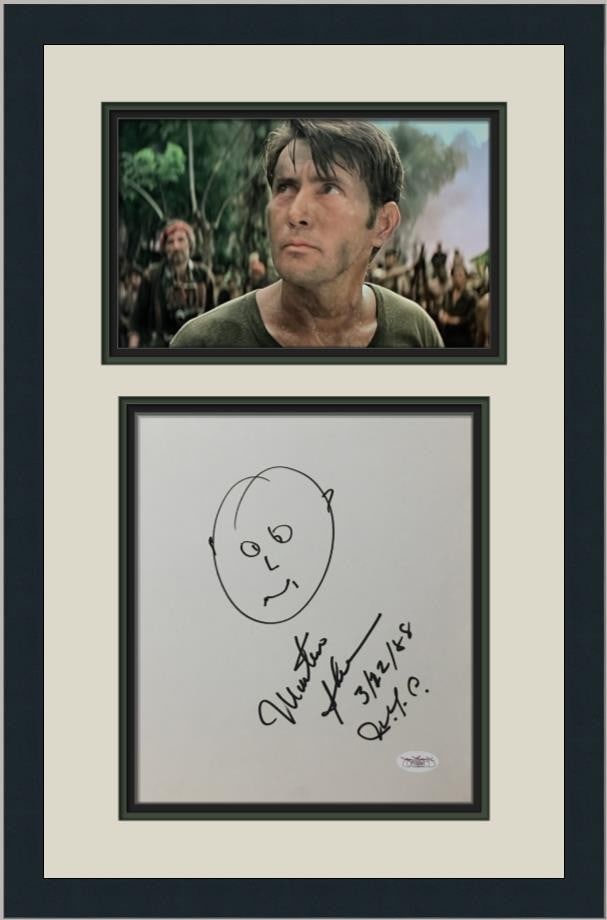 Custom Framed Martin Sheen Signed Artwork With JSA Authentication: Custom Framed Martin Sheen Signed Artwork With JSA Authentication This custom-framed piece features a signed self-portrait by actor Martin Sheen, presented alongside an 8" x 10" photograph. The artwor