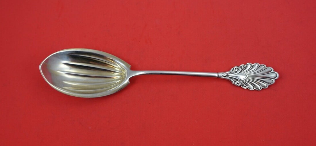 Grecian Gorham Sterling Silver Berry Spoon Fluted Gold Wash 8.5": Grecian Gorham Sterling Silver Berry Spoon Fluted Gold Wash 8.5" This exquisite Grecian berry spoon by Gorham is crafted from high-quality sterling silver and features a beautiful fluted design with a