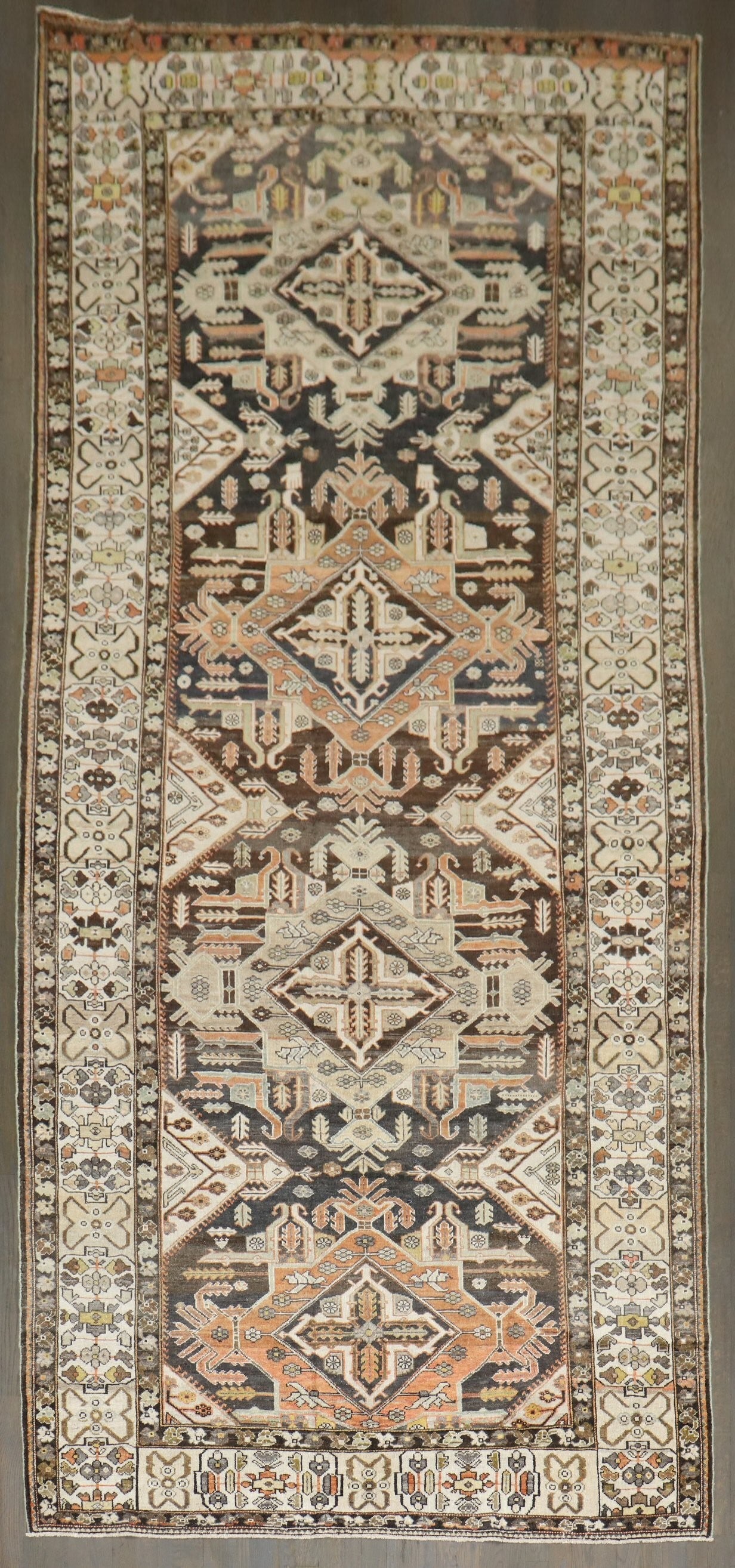 5' 7" x 13' Antique Persian Bakhtiari Gallery Rug Geometric Design: 5' 7" x 13' Antique Persian Bakhtiari Gallery Rug Geometric Design Antique Persian Bakhtiari gallery rug from the 1920s featuring a large-scale geometric design. This pre-owned piece reflects the dist