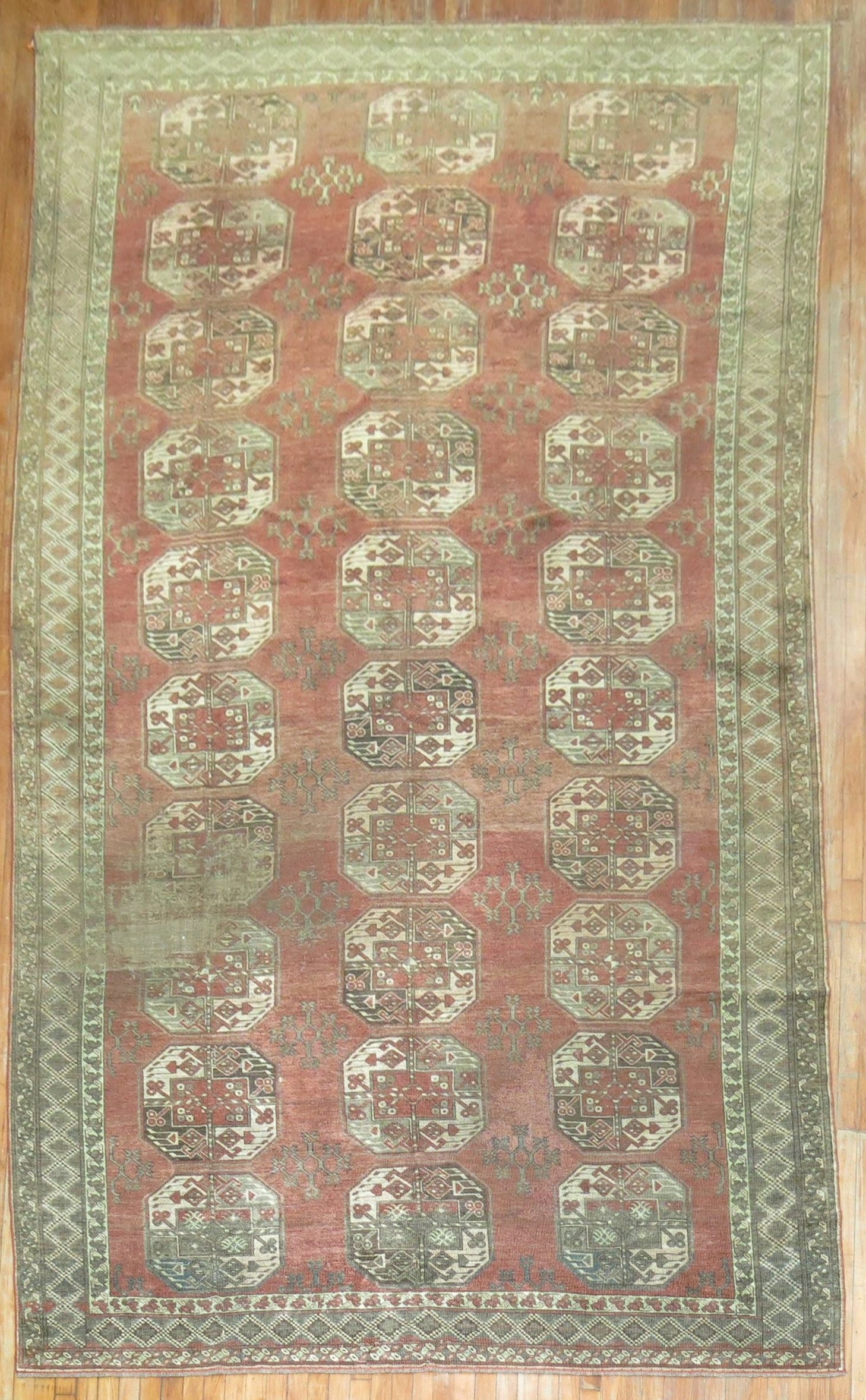 7' 7" x 14' 4" Early 20th Century Ersari Tribal Rug: 7' 7" x 14' 4" Early 20th Century Ersari Tribal Rug Early 20th century Ersari tribal rug with a worn rustic character and shabby chic style. This pre-owned gallery-size rug reflects the distinctive lo