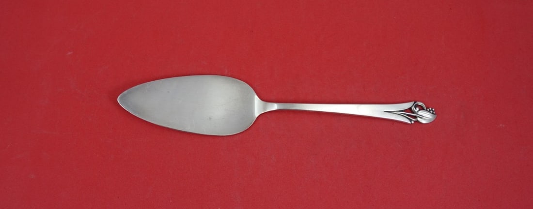 Frank Smith Woodlily Sterling Silver Jelly Knife 7 3 4: Frank Smith Woodlily Sterling Silver Jelly Knife 7 3 4 This is a sterling silver jelly cake knife in the Woodlily pattern by Frank Smith. Measuring 7 3/4 inches, this knife is not monogrammed and is i