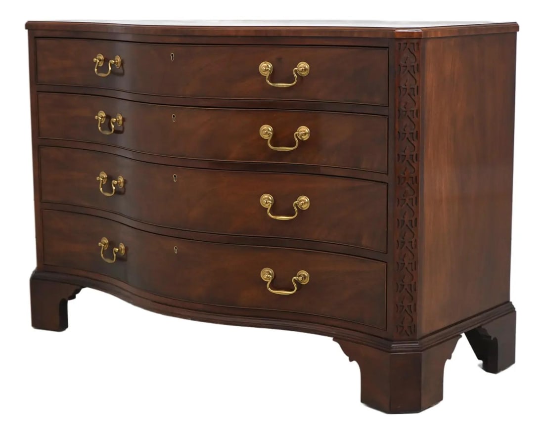 Mahogany Chippendale Style 4 Drawer Chest Serpentine Front 48.5w x 21d x 32.5h: Mahogany Chippendale Style 4 Drawer Chest Serpentine Front 48.5w x 21d x 32.5h A Baker mahogany serpentine 4-drawer chest featuring a curved front, bracket feet, dovetailed drawer construction, fine c