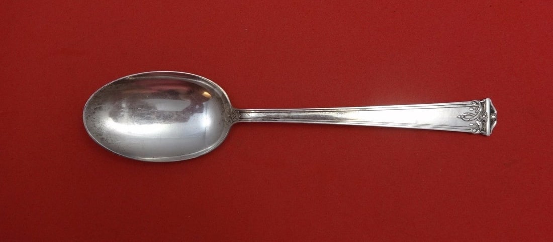 International Silver Trianon Sterling Silver Serving Spoon 8 1/4": International Silver Trianon Sterling Silver Serving Spoon 8 1/4" This exquisite serving spoon, crafted in the Trianon pattern by International Silver, showcases the timeless elegance of sterling silv