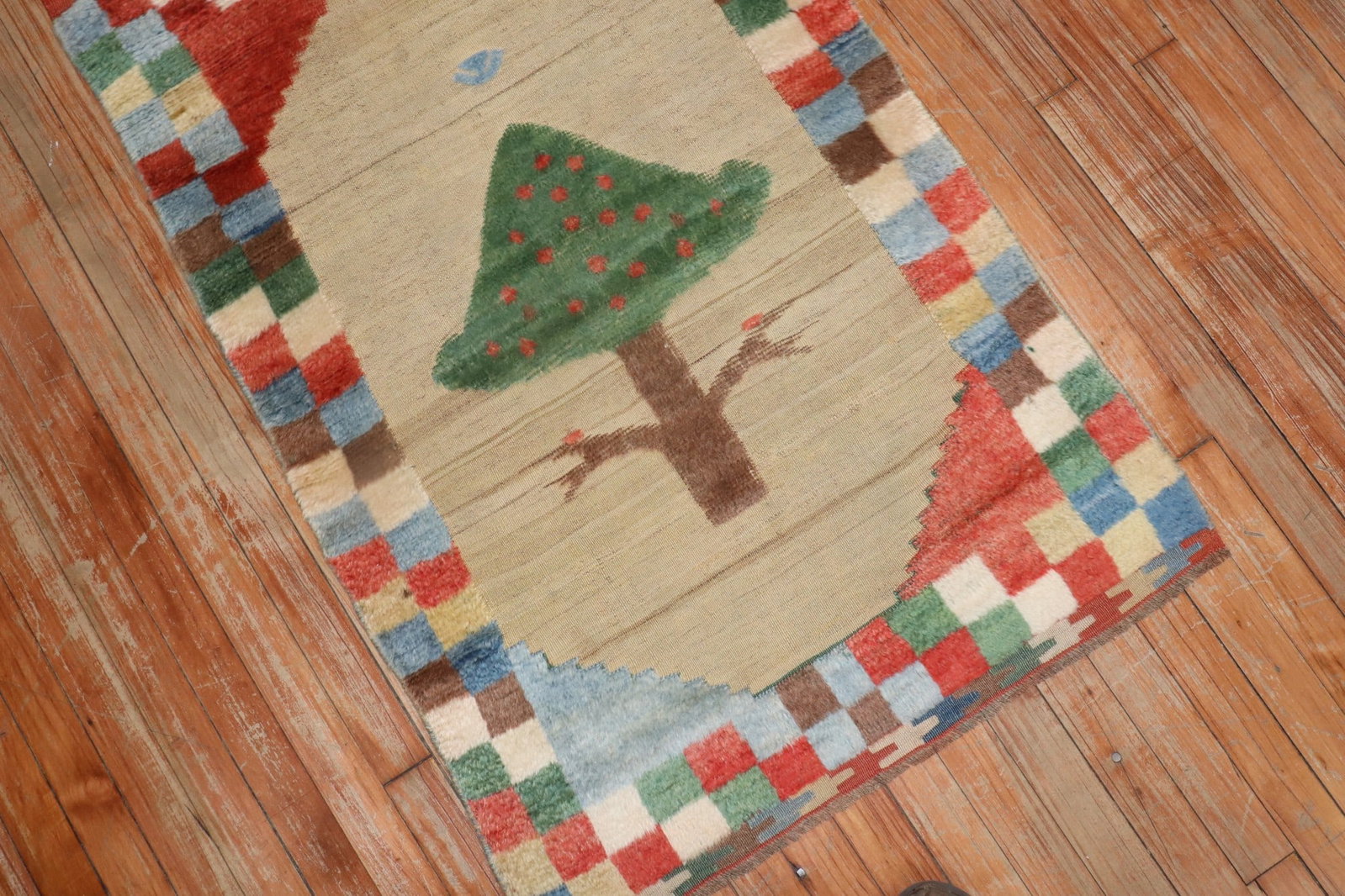 2' 6" x 3' 11" Persian Gabbeh rug with pine tree design: 2' 6" x 3' 11" Persian Gabbeh rug with pine tree design Vintage Gabbeh rug featuring a fun and cheerful pine tree design with a checker pile border. The field is flatweave, and the rug has a high-low 