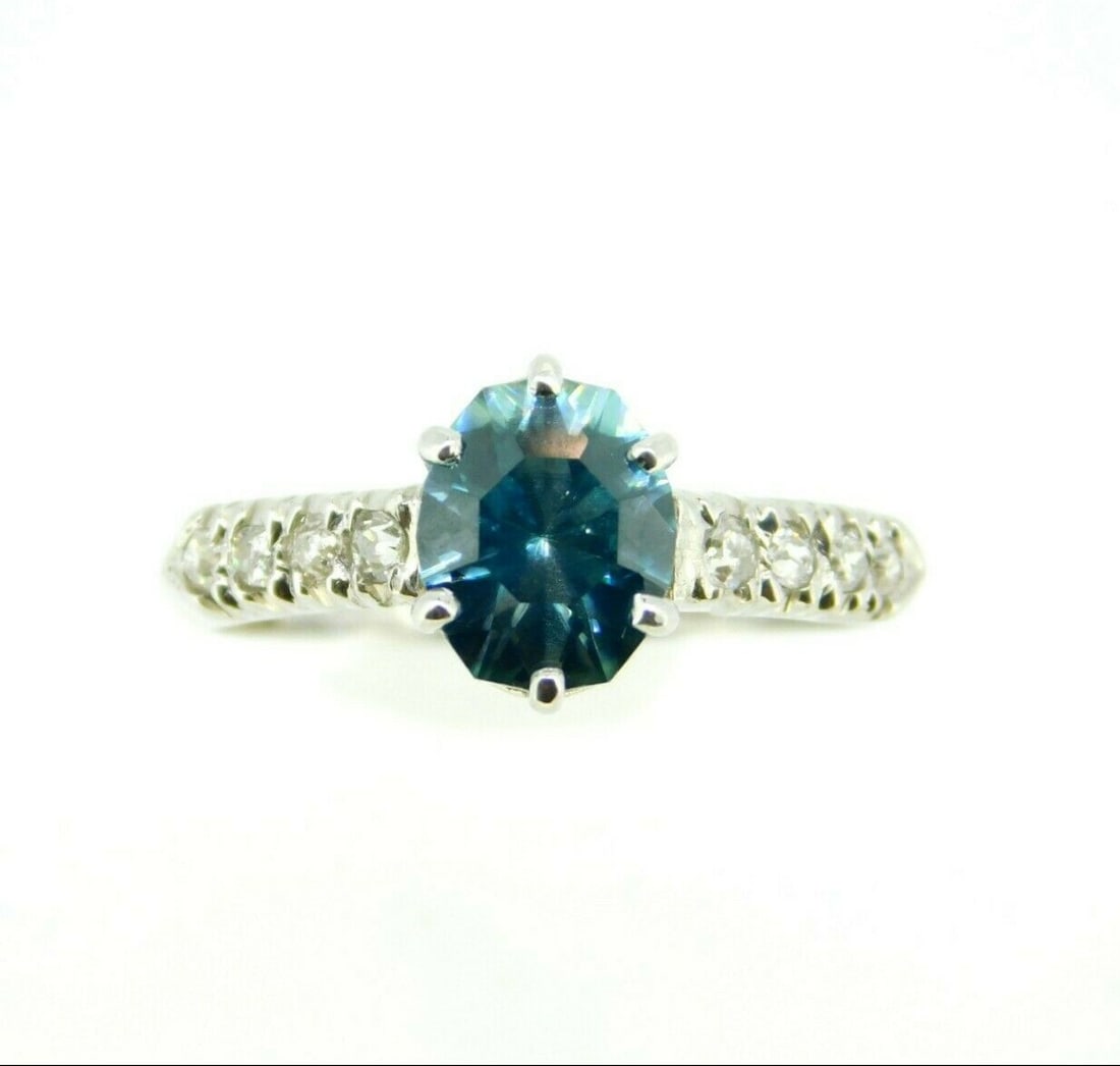 Vintage 14k White Gold 2.88ct Blue Zircon Diamond Ring GIA Certified: Vintage 14k White Gold 2.88ct Blue Zircon Diamond Ring GIA Certified This exquisite 14k white gold ring features a stunning 2.88ct blue genuine natural zircon as its centerpiece. The zircon, showcasin