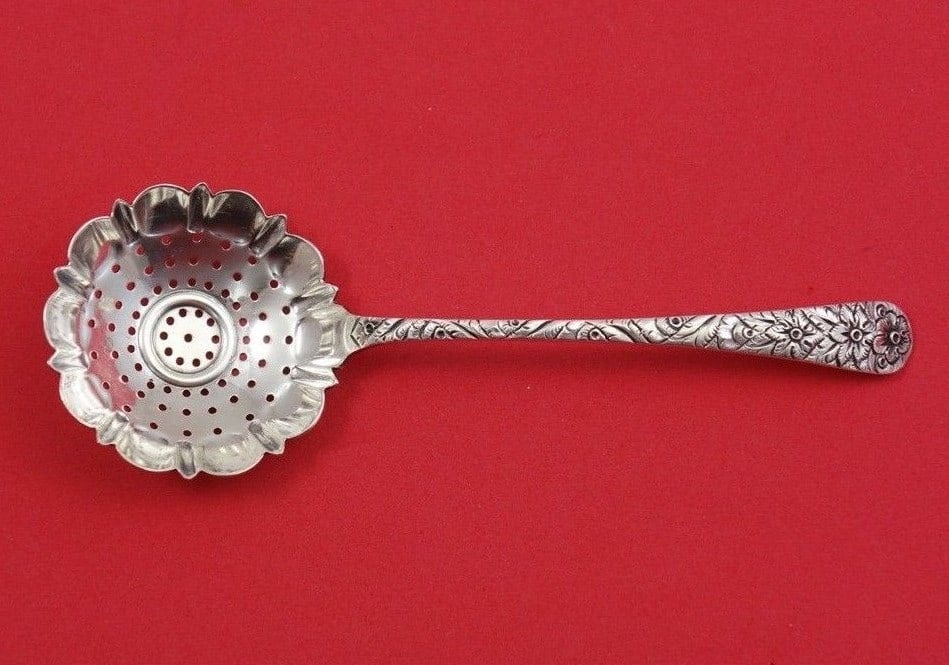 Tiffany Co Antique Engraved Sterling Silver Sugar Sifter 5 1/2 in: Tiffany Co Antique Engraved Sterling Silver Sugar Sifter 5 1/2 in Antique Engraved by Tiffany and Co Sterling Silver Sugar Sifter, measuring 5 1/2 inches. Made in the United States, this piece dates t