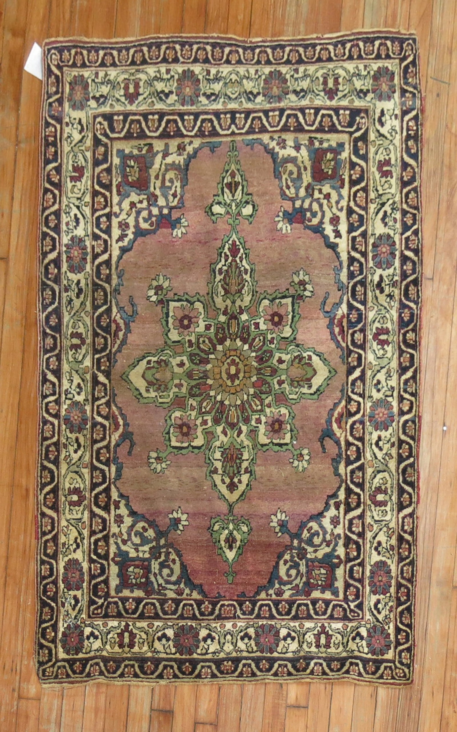 3' 3" x 4' 8" Purple Persian Kerman Rug circa 1920: 3' 3" x 4' 8" Purple Persian Kerman Rug circa 1920 Pre-owned Persian Lavar Kerman rug in a purple colorway, dating to circa 1920. This small rug features the classic Kerman style and presents a detail