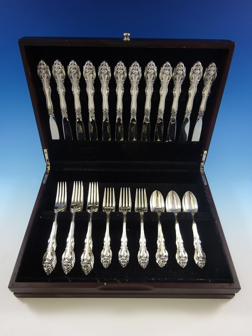 Gorham La Scala Sterling Silver Flatware Set for 12 48 Pieces: Gorham La Scala Sterling Silver Flatware Set for 12 48 Pieces Elevate your dining experience with the La Scala Sterling Silver Flatware Set by Gorham, designed to serve 12. This exquisite set includes