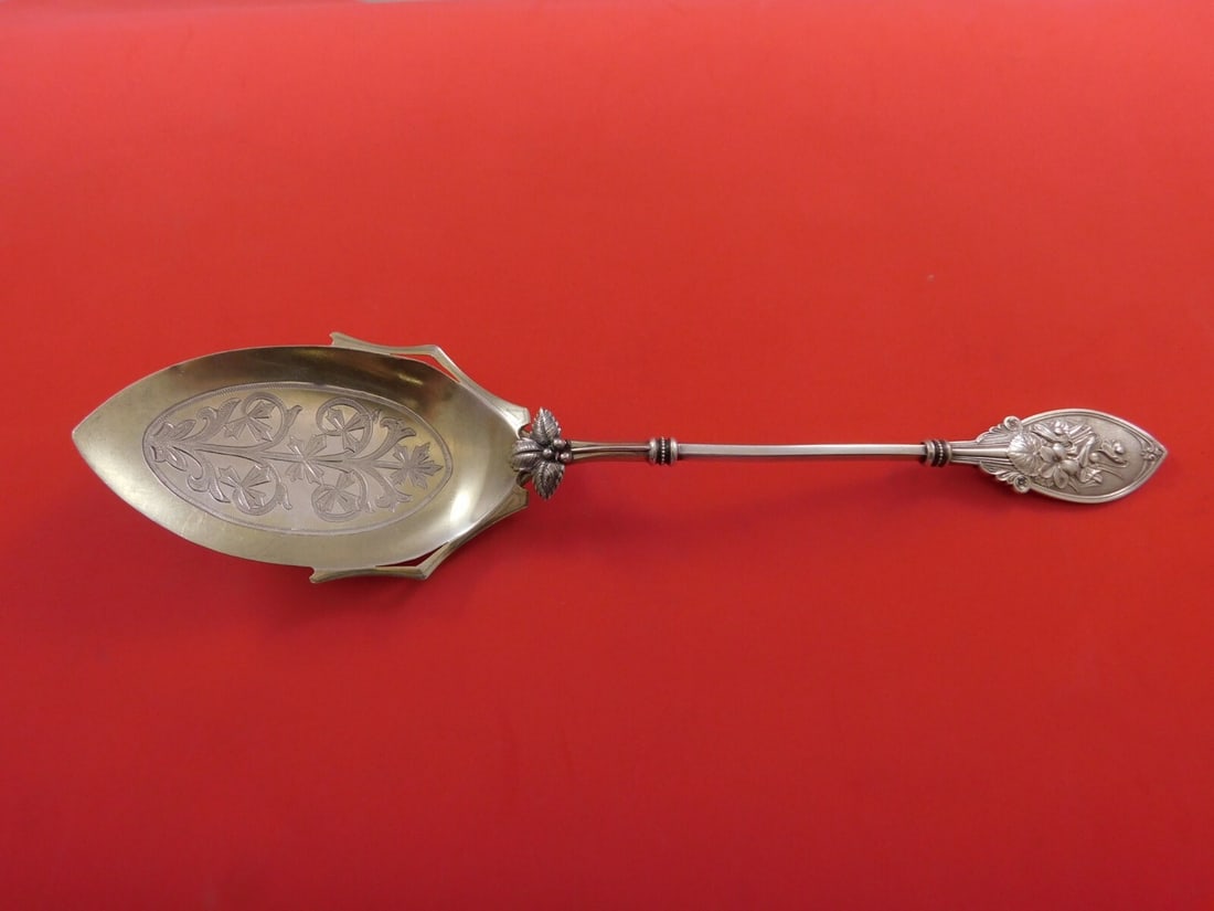Whiting Sterling Silver Berry Spoon 11 Goldwashed Bowl 3D Flower Design: Whiting Sterling Silver Berry Spoon 11 Goldwashed Bowl 3D Flower Design This exquisite Whiting Sterling Silver Berry Spoon features a stunning 3D applied flower design and a beautifully bright-cut, go