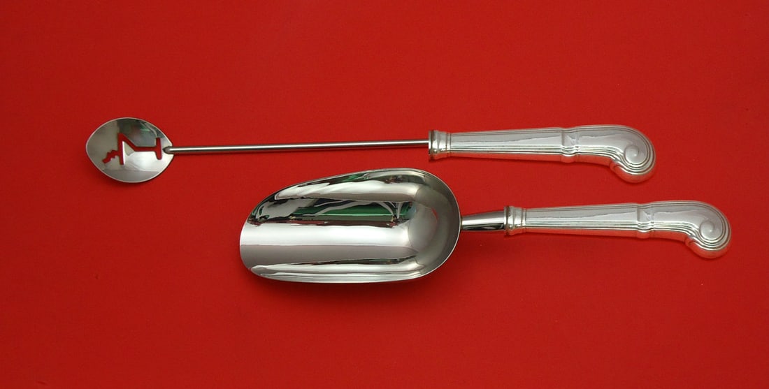 Tiffany & Co Castilian Sterling Silver Bar Set 2pc Martini Spoon Ice Scoop: Tiffany & Co Castilian Sterling Silver Bar Set 2pc Martini Spoon Ice Scoop Elevate your entertaining with this exquisite 2-piece bar set from Tiffany & Co., featuring the elegant Castilian pattern. Th