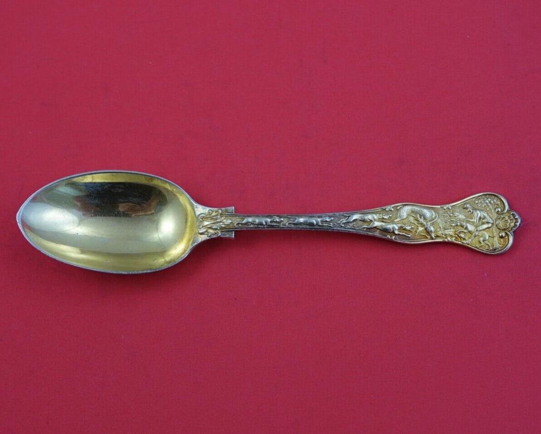Garrard Co Stag Hunt vermeil sterling dessert spoon 7 1/4: Garrard Co Stag Hunt vermeil sterling dessert spoon 7 1/4 English sterling silver dessert spoon in the Stag Hunt pattern by Garrard & Co. The piece is vermeil, meaning it is completely gold washed, an