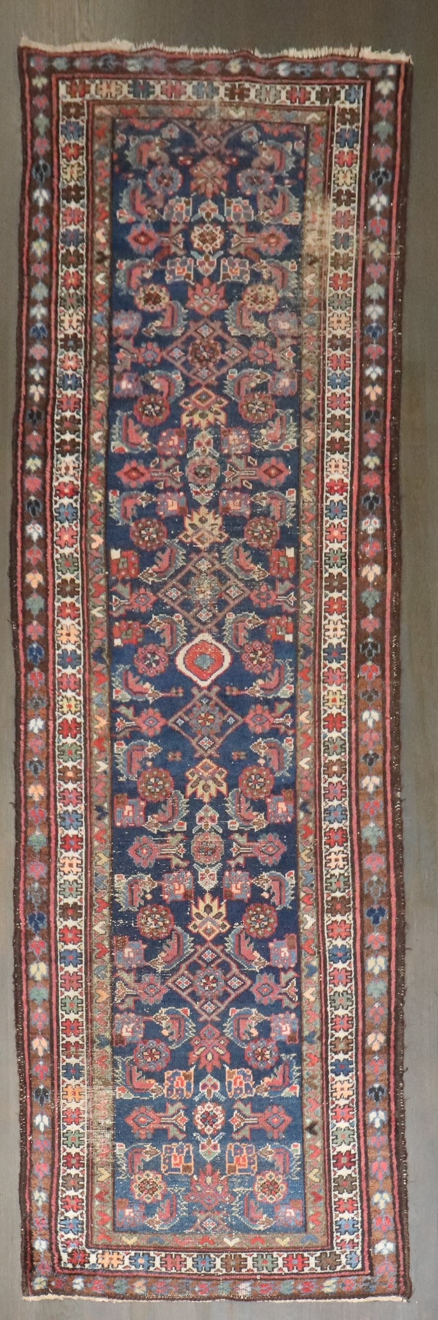 Persian Hamedan Runner Rug 3' 1" x 10' Early 20th Century: Persian Hamedan Runner Rug 3' 1" x 10' Early 20th Century Early 20th century Persian Hamedan runner with a navy worn finish and shabby chic style. This pre-owned runner offers the character of a vinta