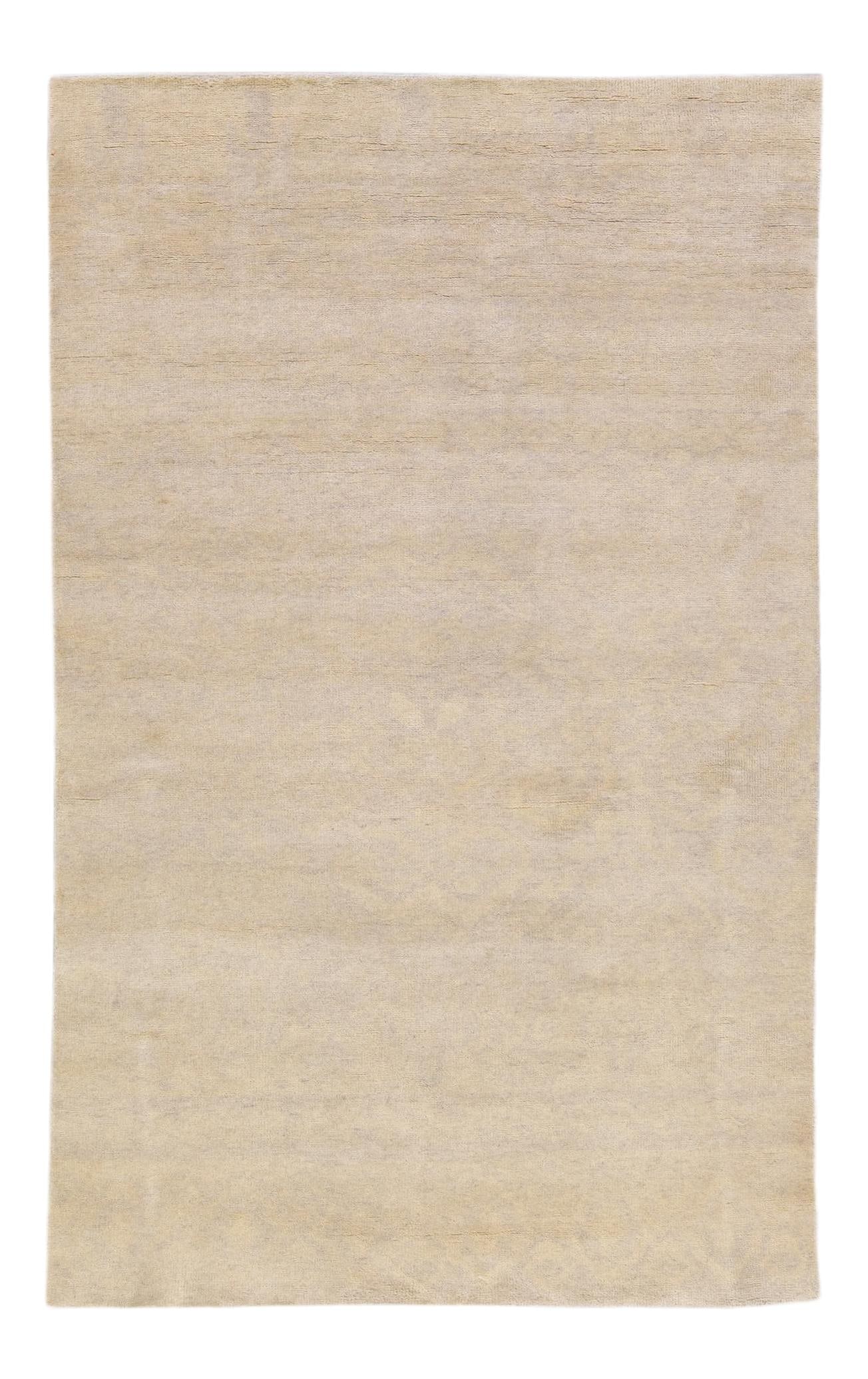 Modern Handmade Seamless Beige Wool Rug 6'4 x 10'4 Moroccan Style: Modern Handmade Seamless Beige Wool Rug 6'4 x 10'4 Moroccan Style Enhance your living space with this exquisite Moroccan style handmade wool rug. Featuring a serene beige field adorned with a stunning