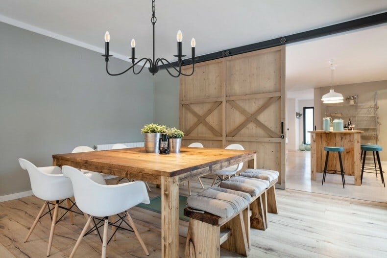 Living District Rohan 4-Light Matte Black Iron Chandelier 30 Inch: Living District Rohan 4-Light Matte Black Iron Chandelier 30 Inch This chandelier features a farmhouse-inspired design with a matte black metal frame and wrought iron style, offering a striking additi