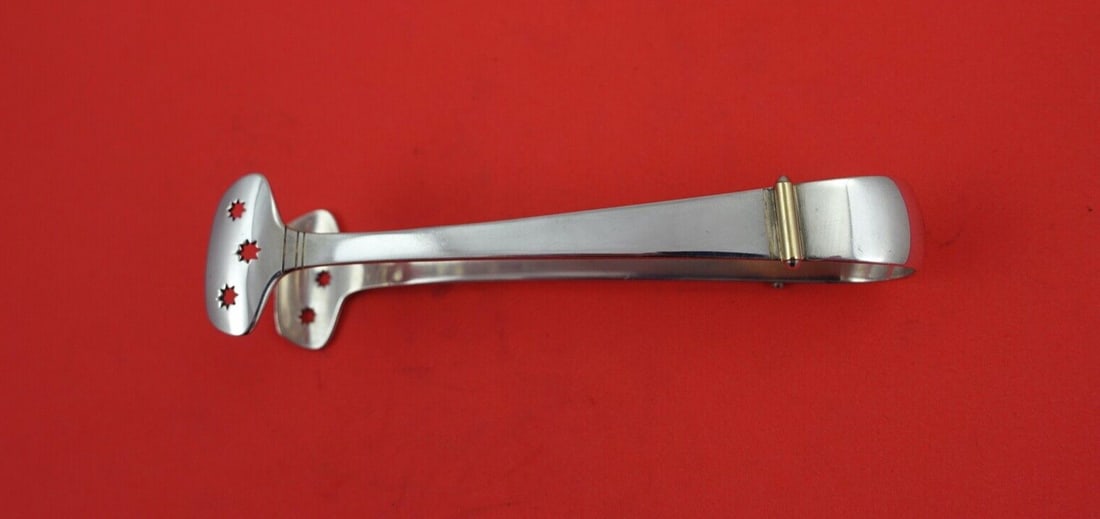 Gorham Gold Tip Sterling Silver Asparagus Tong 4 3/4" Pierced Stars: Gorham Gold Tip Sterling Silver Asparagus Tong 4 3/4" Pierced Stars This exquisite asparagus tong by Gorham features the elegant Gold Tip pattern and is crafted from high-quality sterling silver. Meas