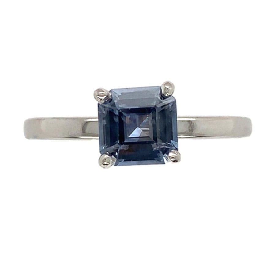 1.03 Carat Ceylon Blue Sapphire Solitaire Ring in Platinum: 1.03 Carat Ceylon Blue Sapphire Solitaire Ring in Platinum This exquisite solitaire ring showcases a stunning 1.03 carat genuine natural Ceylon blue sapphire, featuring an elegant Asscher cut that mea