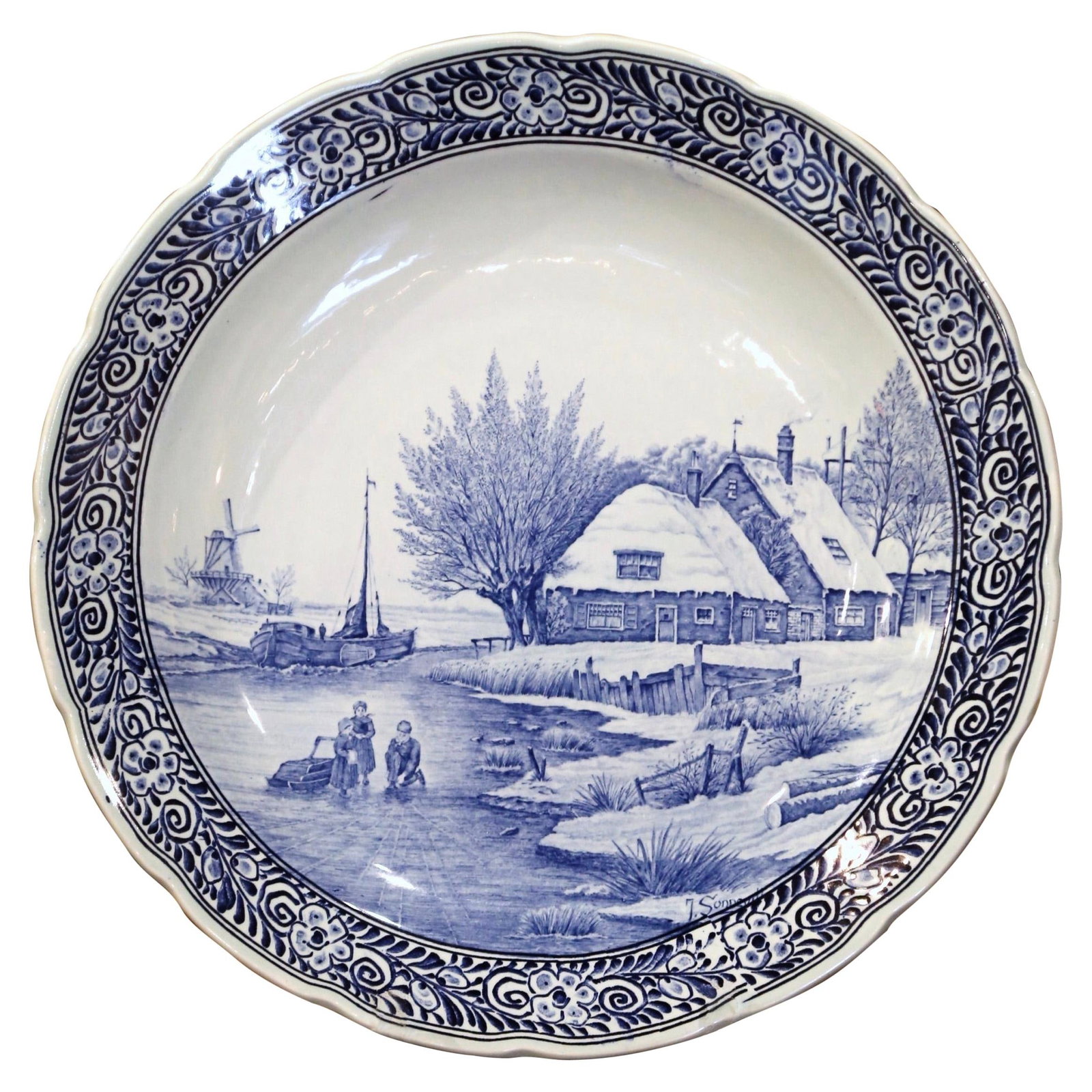 Royal Sphinx Maastricht Delft Blue Wall Hanging Charger: Royal Sphinx Maastricht Delft Blue Wall Hanging Charger This mid-century Dutch Delft wall charger was crafted circa 1960 by Royal Sphinx Maastricht. Made from hand-painted ceramic faience, the large p