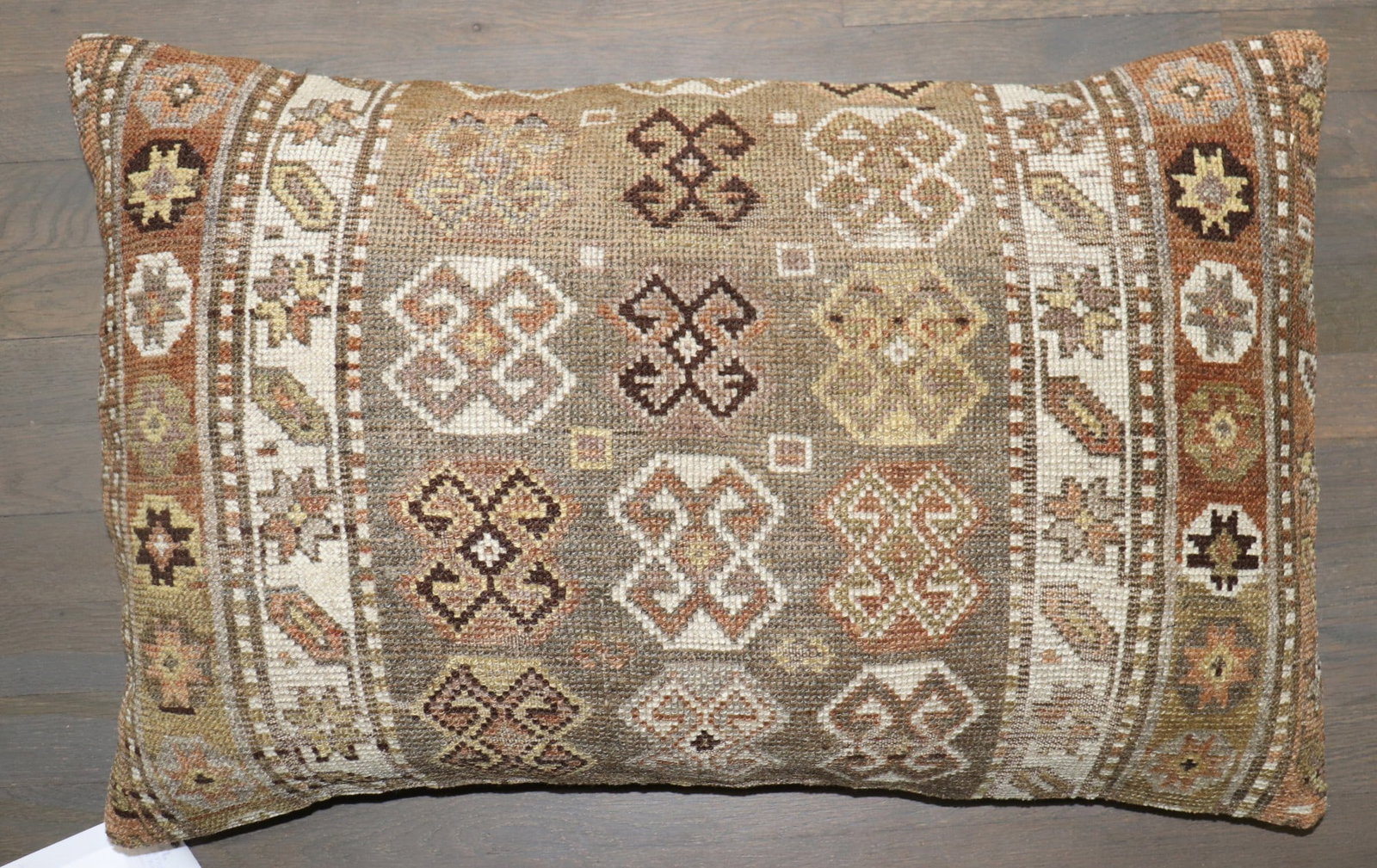 1' 7" x 2' 8" Persian Shiraz Rug Pillow Antique: 1' 7" x 2' 8" Persian Shiraz Rug Pillow Antique Decorative pillow made from a tribal early 20th century Persian Shiraz rug. This pre-owned piece offers the character of an antique rug in pillow form. 