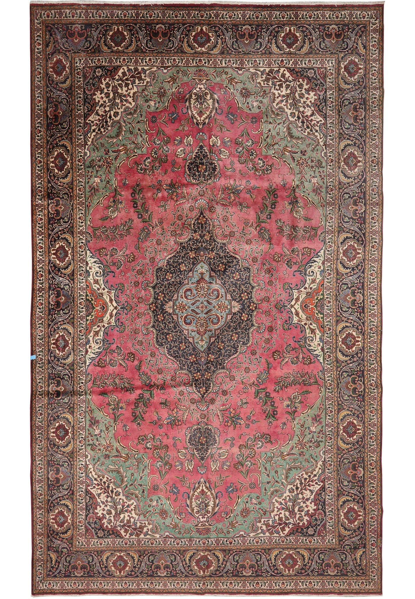 11 x 18 Persian Tabriz Wool Rug Hand Knotted Iran: 11 x 18 Persian Tabriz Wool Rug Hand Knotted Iran Free continental US Shipping This pre-owned Persian Tabriz wool rug is a large-scale, hand-knotted carpet made in Iran. It features an open red field 