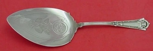 Whiting Egyptian Sterling Silver Pie Server Engraved Blade 8.5": Whiting Egyptian Sterling Silver Pie Server Engraved Blade 8.5" This elegant pie server features a beautifully engraved blade and a flat handle, both crafted from sterling silver. Manufactured by Whit