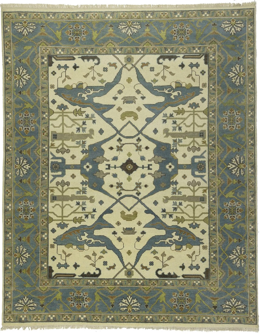 9'3 x 11'7 Hand Knotted Wool Oushak Rug Cream Floral: 9'3 x 11'7 Hand Knotted Wool Oushak Rug Cream Floral Hand-knotted wool area rug in a cream floral Oushak Chobi style with muted accent colors including blue, golden beige, and brown. This rectangular 