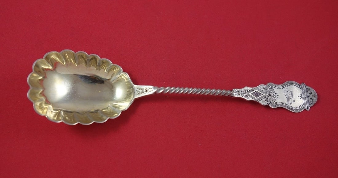 Hotchkiss & Schreuder Sterling Silver Gold Washed Berry Spoon 8 3/4": Hotchkiss & Schreuder Sterling Silver Gold Washed Berry Spoon 8 3/4" Discover the elegance of this Hotchkiss & Schreuder Berry Spoon, crafted in fine sterling silver with a sophisticated gold wash fin