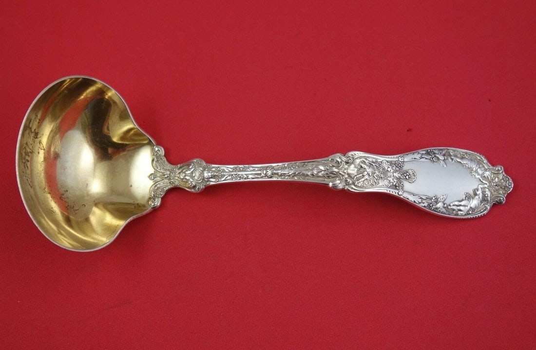 Gorham Paris Sterling Silver Gravy Ladle Gold Wash 7 3/4": Gorham Paris Sterling Silver Gravy Ladle Gold Wash 7 3/4" Discover the elegance of the Paris by Gorham gravy ladle, crafted from sterling silver with a luxurious gold wash finish. Measuring 7 3/4" in 