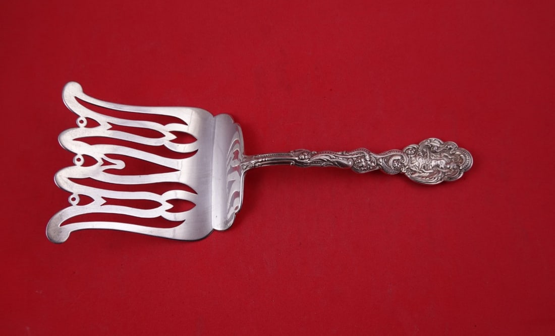 Gorham Versailles Sterling Silver Pierced Asparagus Serving Fork 9": Gorham Versailles Sterling Silver Pierced Asparagus Serving Fork 9" A sterling silver asparagus serving fork in the Versailles pattern by Gorham. The fork features a pierced and fancy design, is not m