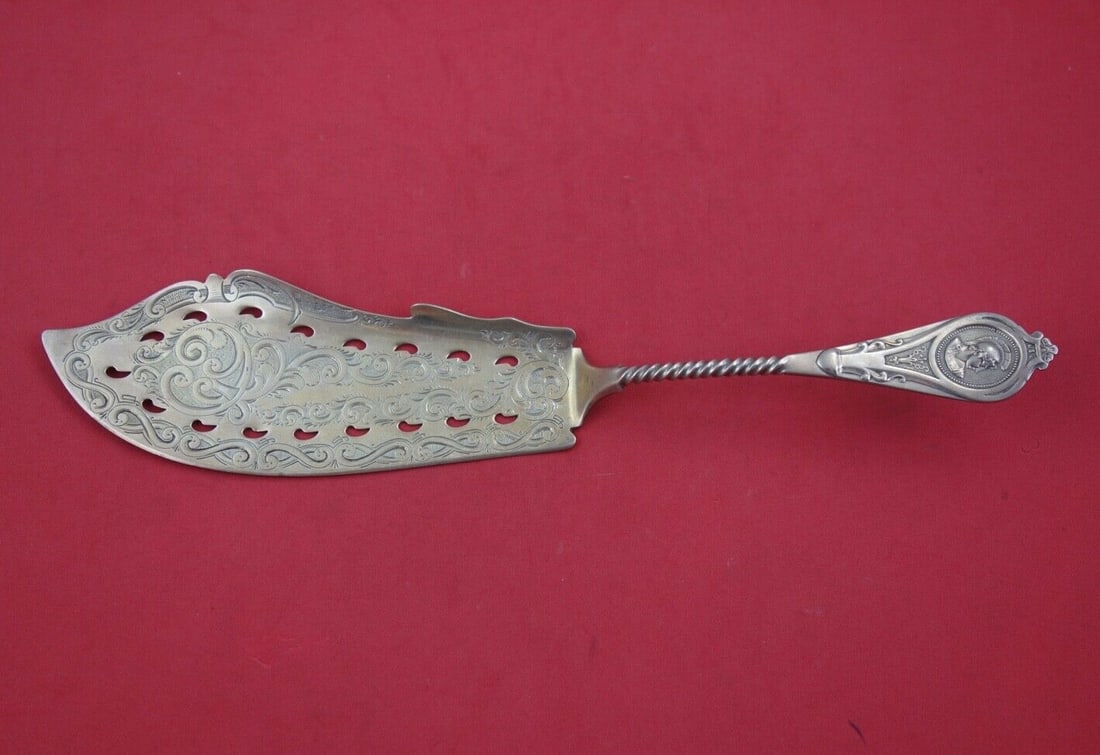 Albert Coles Medallion Sterling Silver Fish Server 11 3/8 inches Brite-Cut: Albert Coles Medallion Sterling Silver Fish Server 11 3/8 inches Brite-Cut This exquisite fish server, crafted by Albert Coles, features a striking Brite-Cut and pierced design. Made from high-quality