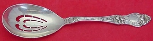 Frank Whiting Lily Sterling Silver 8.5 Inch Ice Spoon: Frank Whiting Lily Sterling Silver 8.5 Inch Ice Spoon This exquisite ice spoon features the elegant Lily pattern by Frank Whiting, crafted from high-quality sterling silver. The ovoid pierced design m