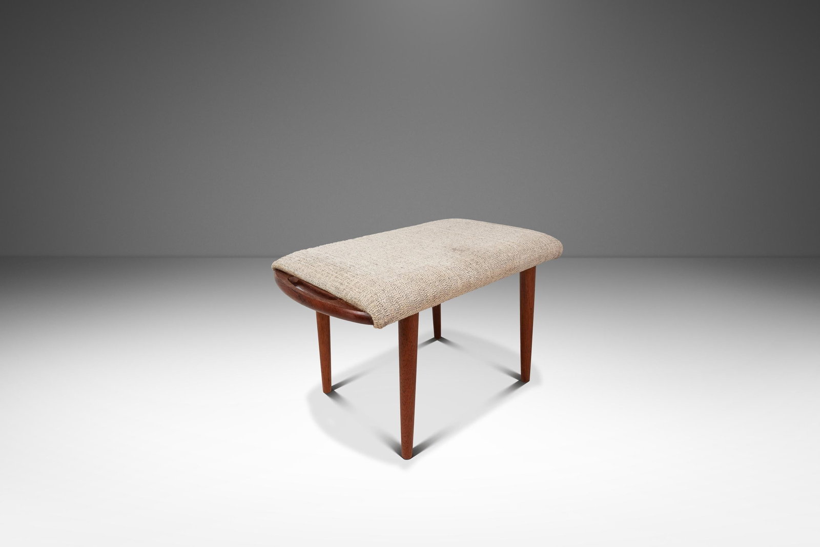 Teak Danish Modern Footstool Ottoman Inspired by Hans Wegner 1980s: Teak Danish Modern Footstool Ottoman Inspired by Hans Wegner 1980s This Danish Mid-Century Modern foot stool or ottoman, styled after Hans Wegner's iconic designs, features a solid Burmese teak frame 