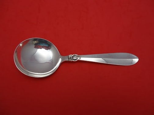 Frigast Princess Fuchsia Sterling Silver Berry Spoon 7 5/8 inches: Frigast Princess Fuchsia Sterling Silver Berry Spoon 7 5/8 inches This exquisite berry spoon is crafted from sterling silver and features the elegant 'Princess Fuchsia' pattern by Frigast. Measuring 7